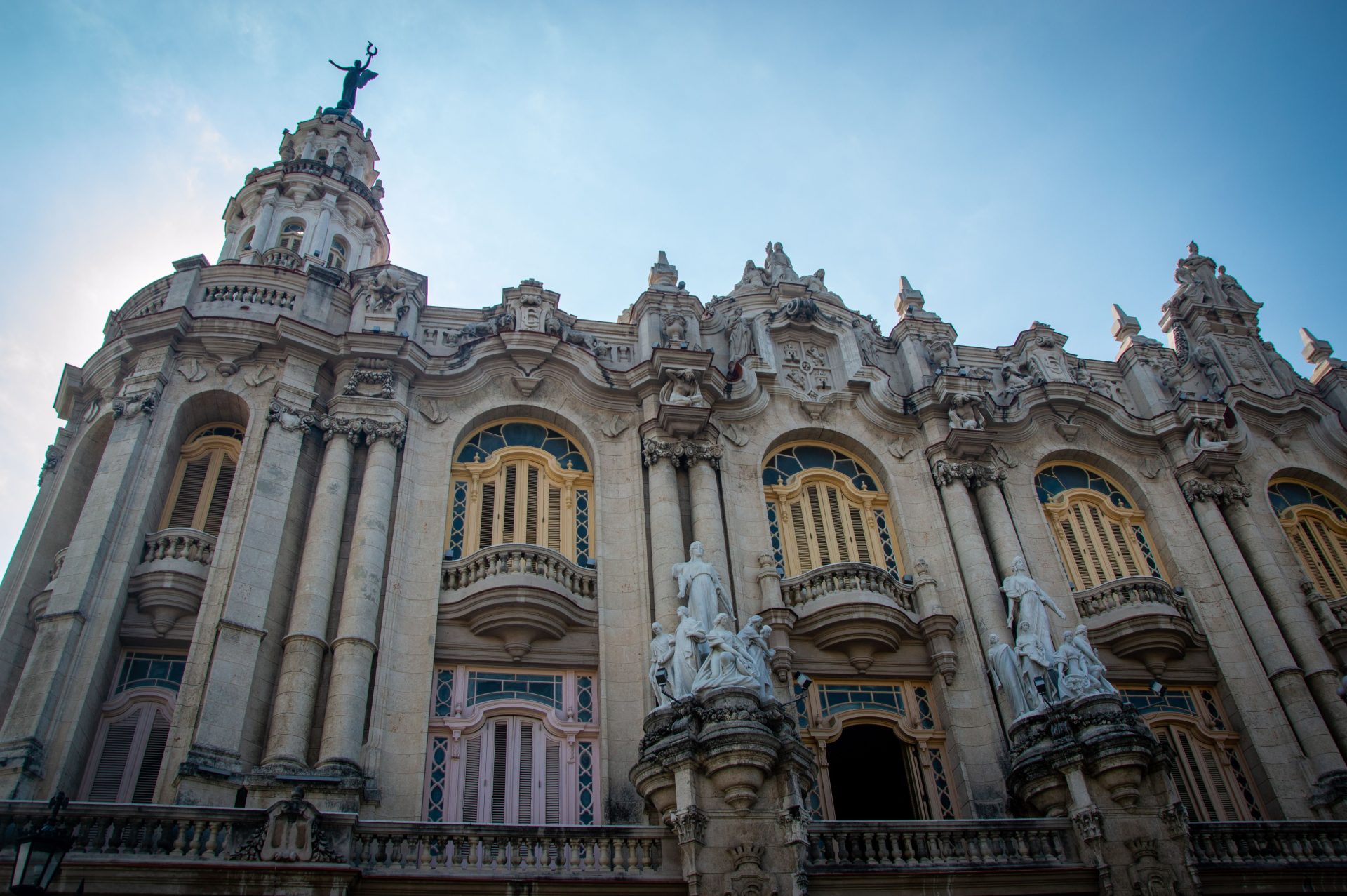 The ornate facade of a grand Havana theatre building
