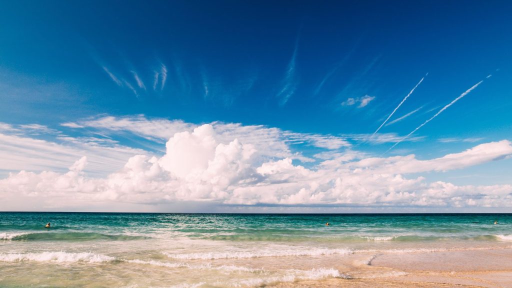 A tranquil seascape of Varadero Beach in Cuba with clear skies and turquoise waters.