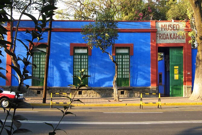 The cobalt blue wall and green doors of La Casa Azul, the Frida Kahlo Museum in Coyoacan