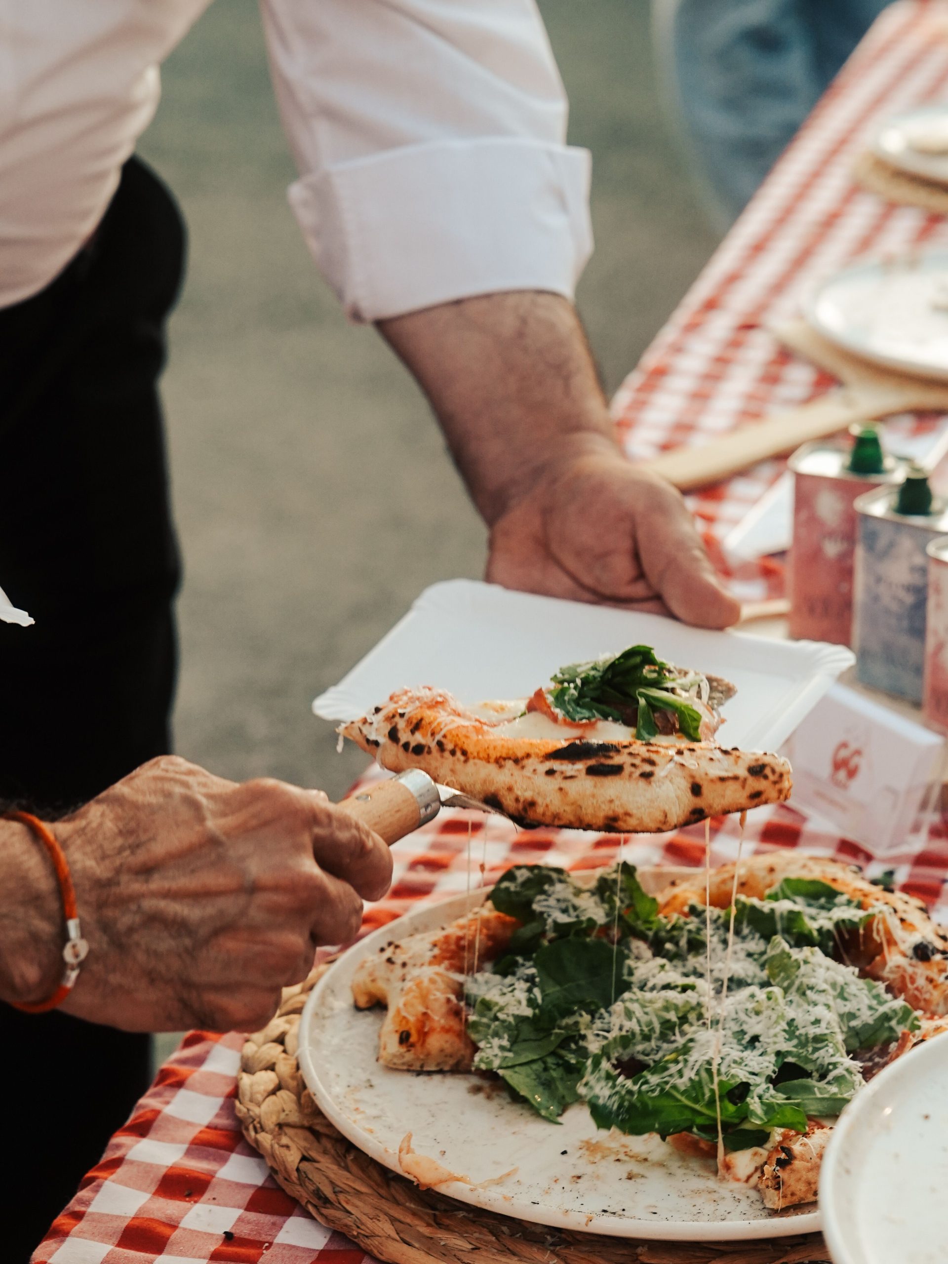 A Neapolitan pizza with a thick charred and blistered crust