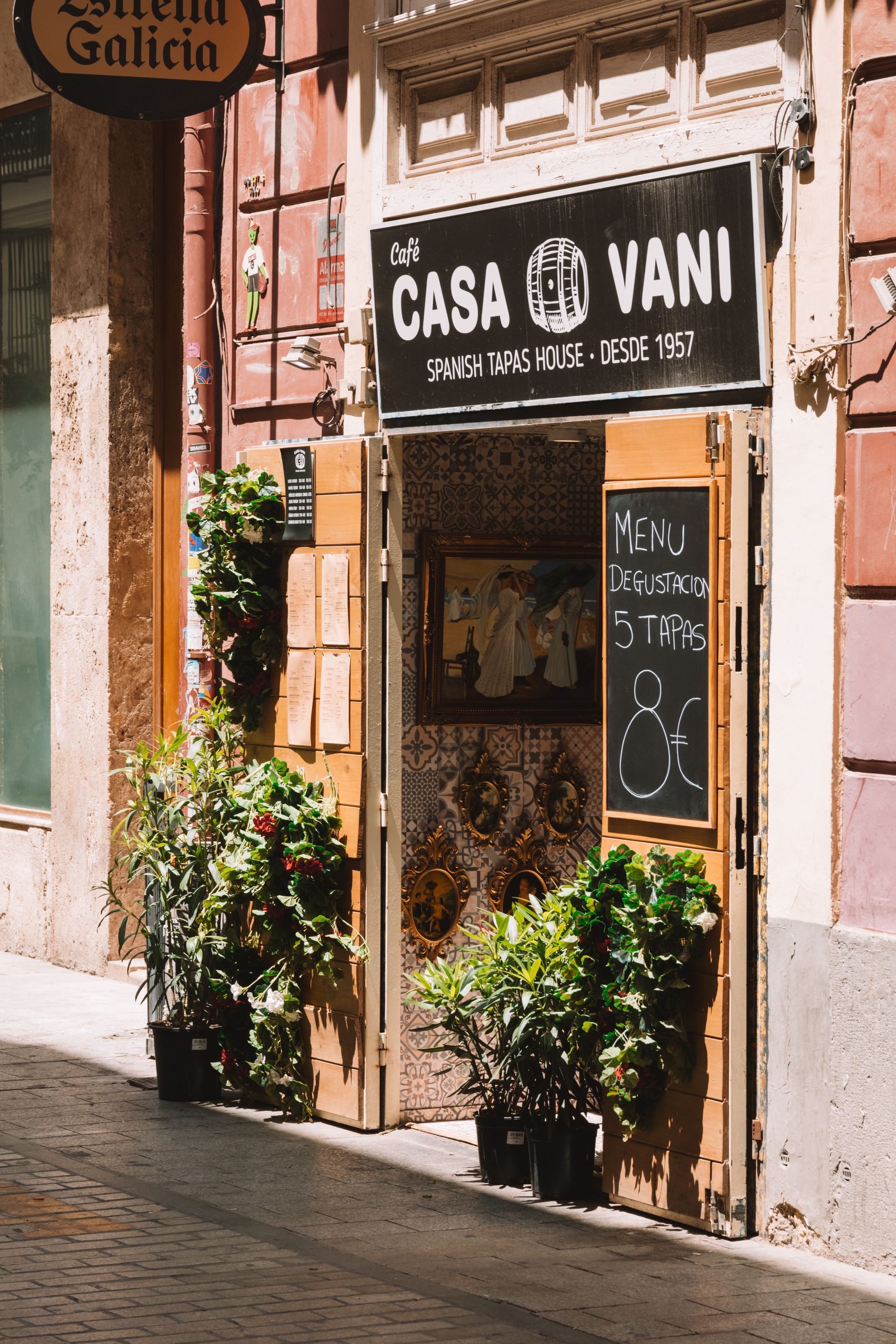 Ivy-covered walls and shuttered windows on a Roman side street