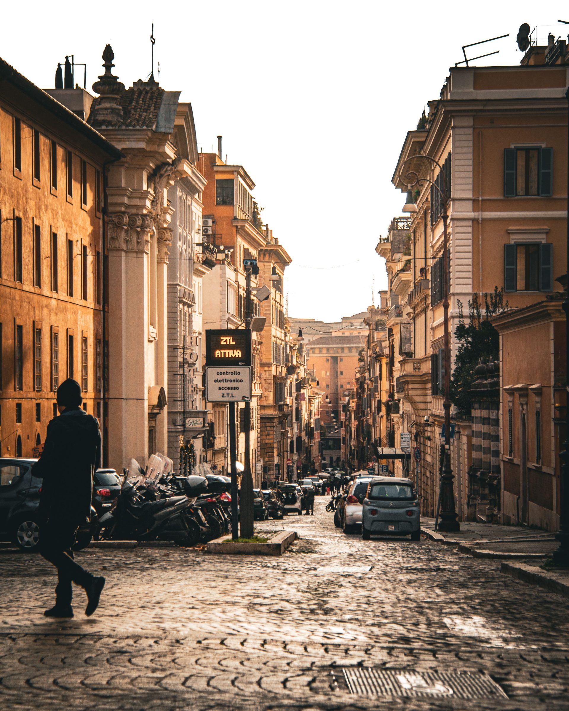 A Roman facade with balconies in afternoon light