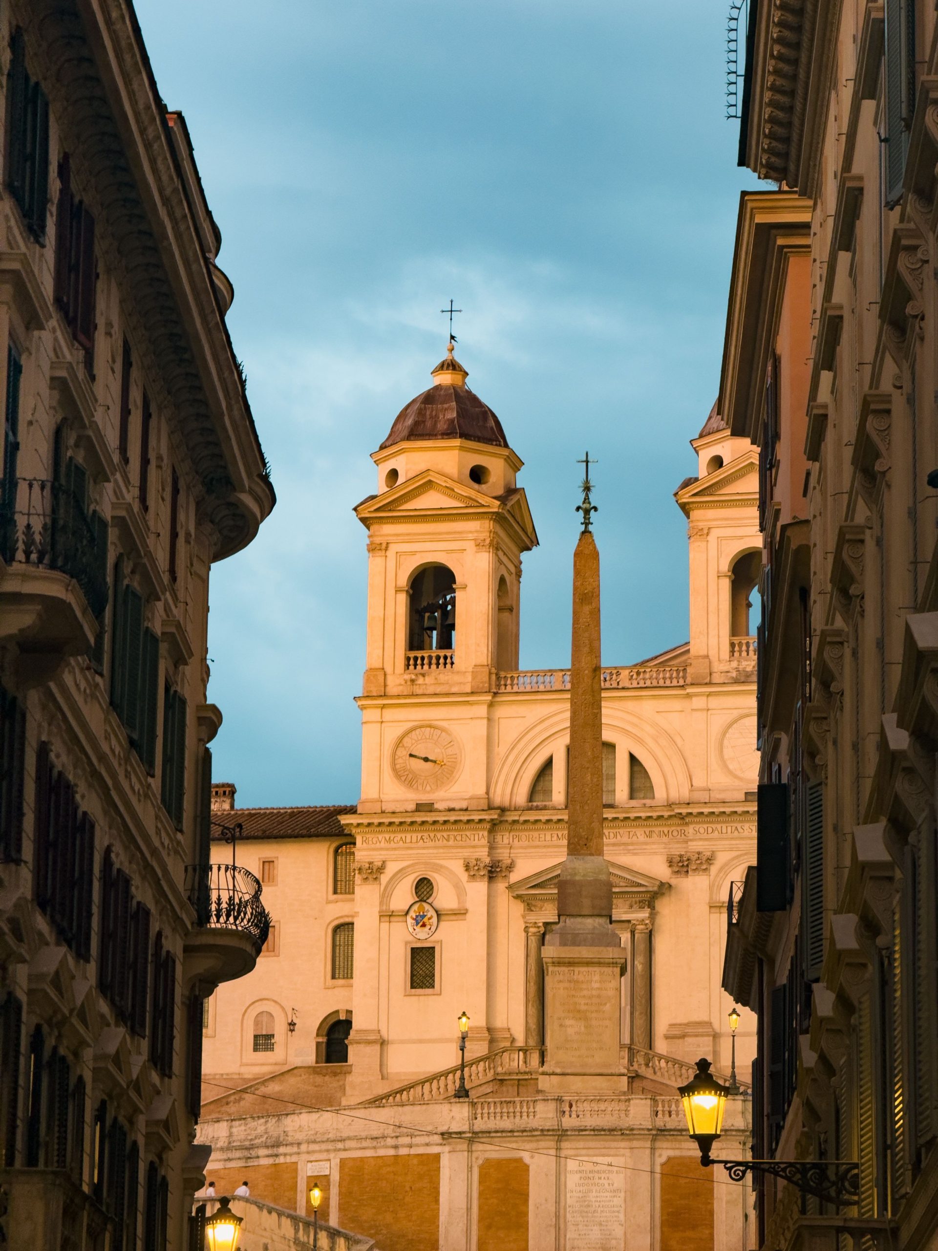 A twin-towered Roman church above a flight of steps