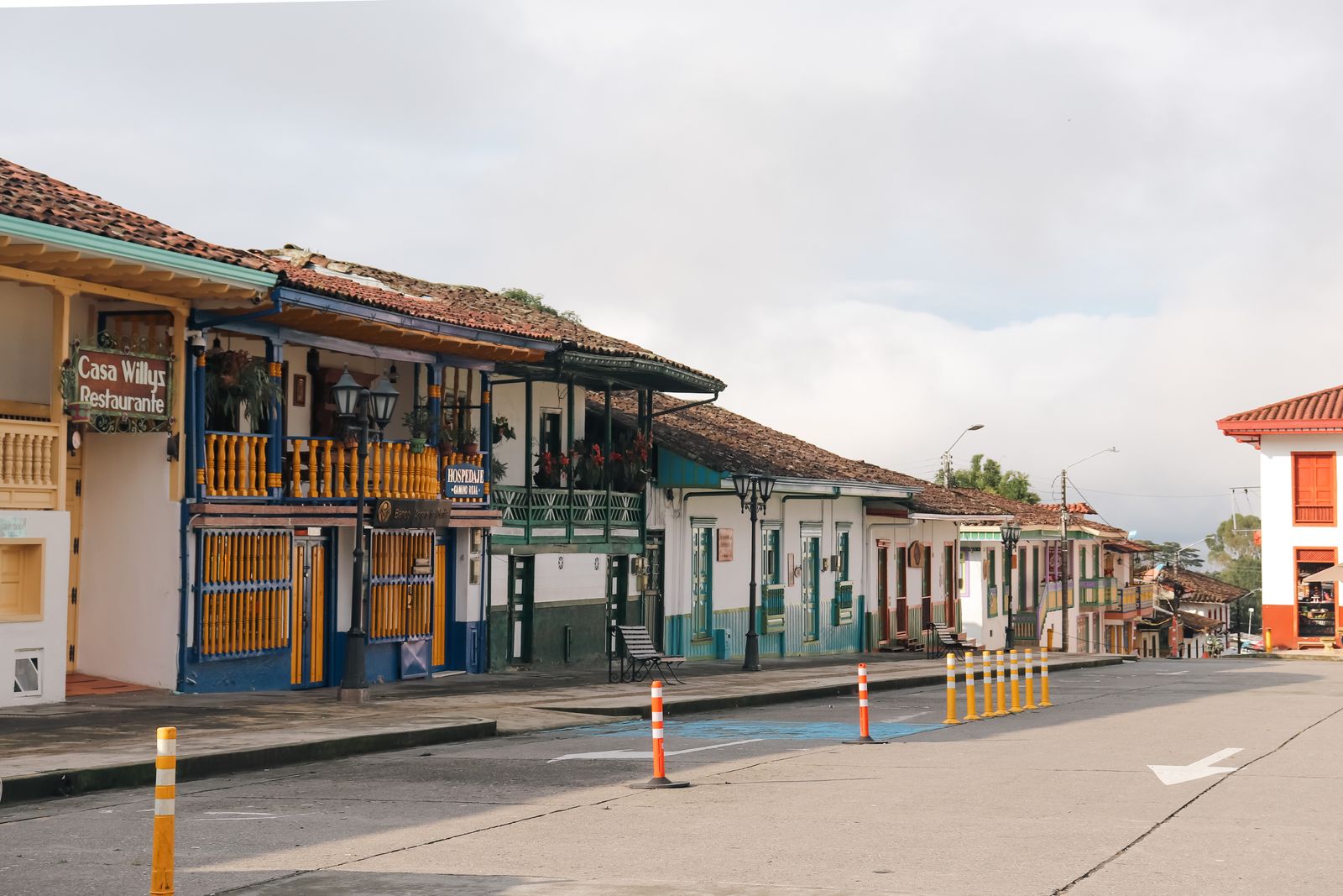 Brightly painted balconies along a street in Salento, Colombia