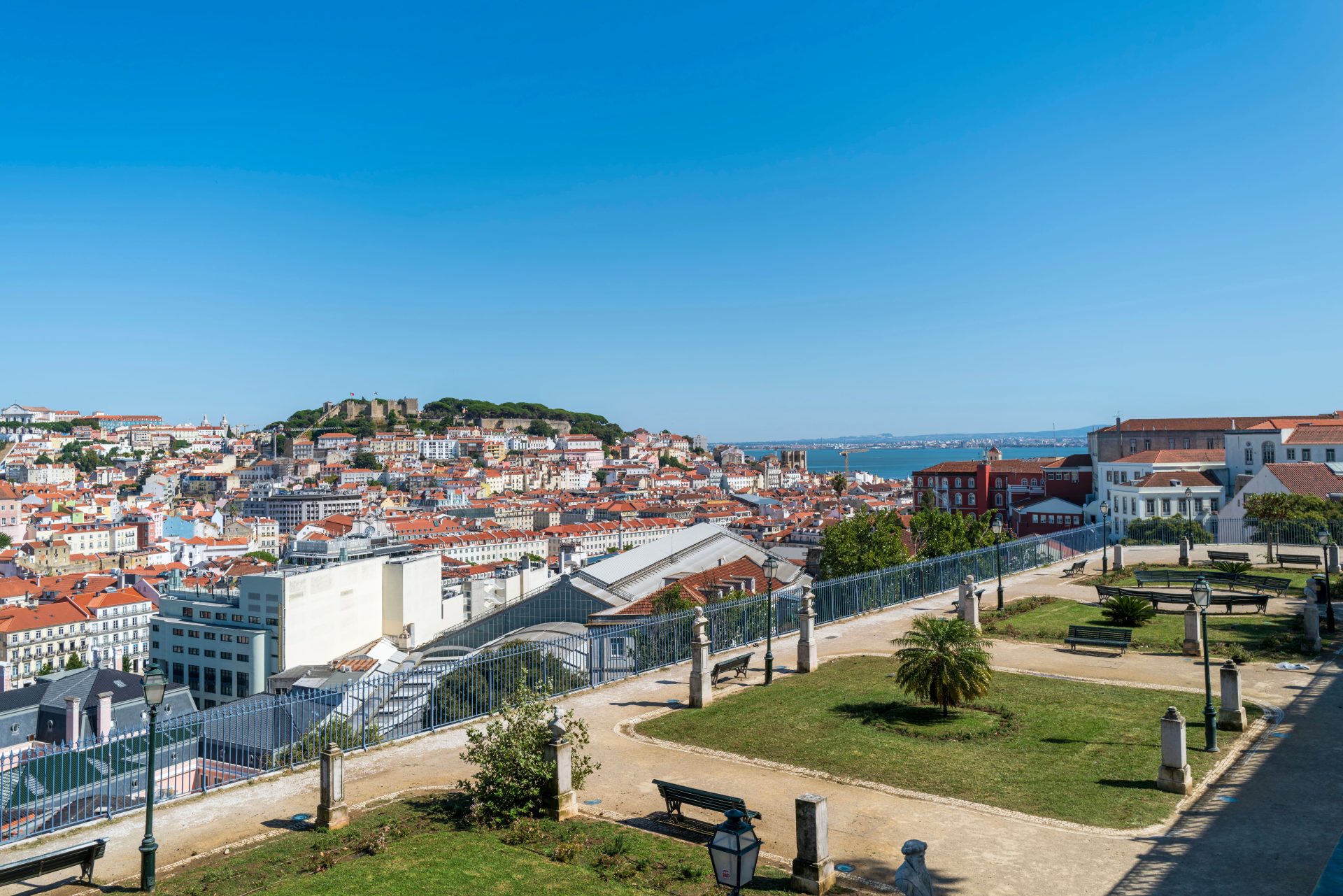 A garden miradouro looking across Lisbon