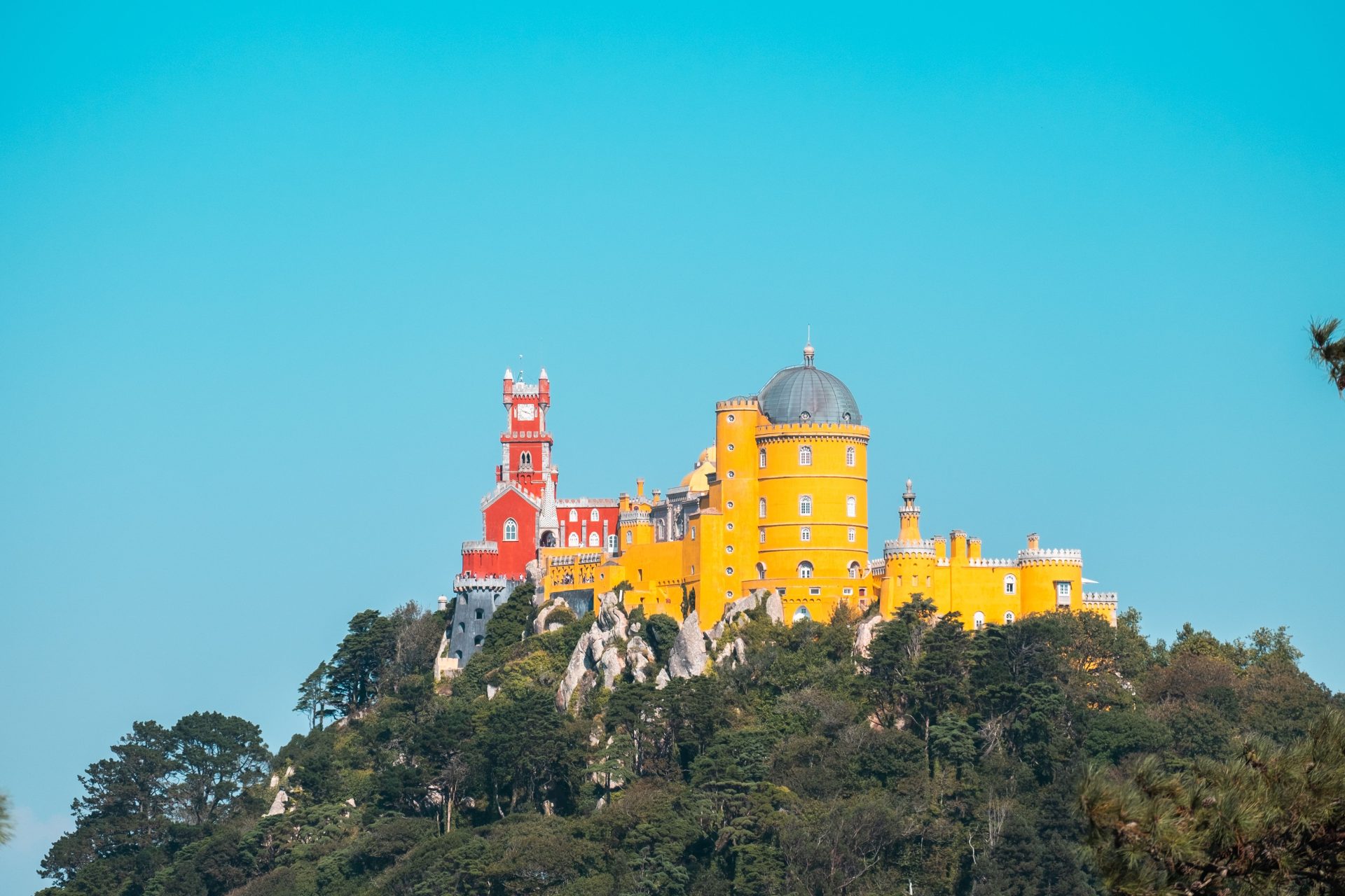 Pena Palace, which is worth the crowds only if you beat them.