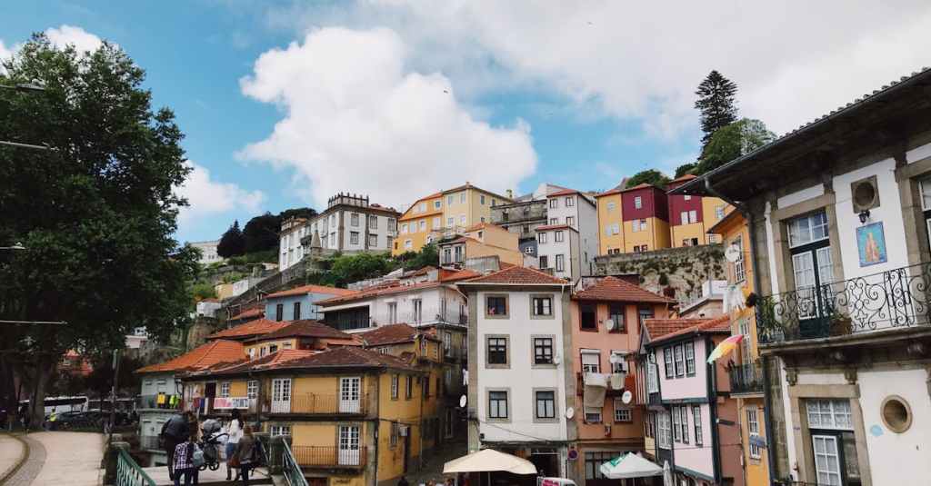 Colorful houses stacked on the hillside above the Douro