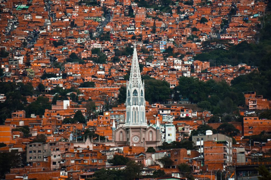 Things to do in Medellin: hillside neighbourhood and church