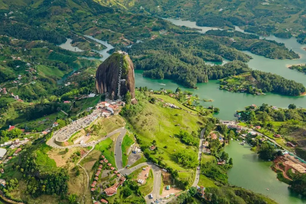 Aerial view of the Peñol Rock rising above the flooded valleys and islands of Guatapé