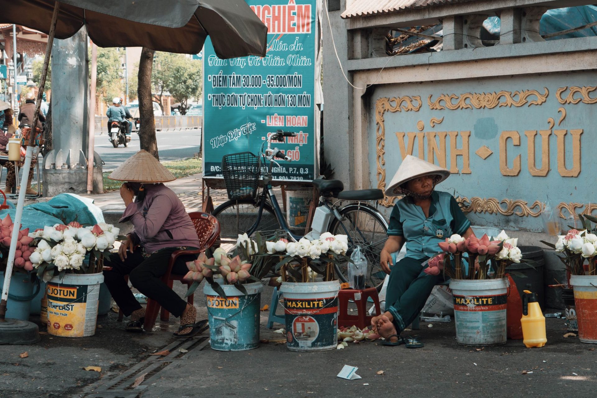 Vendors working the street between showers