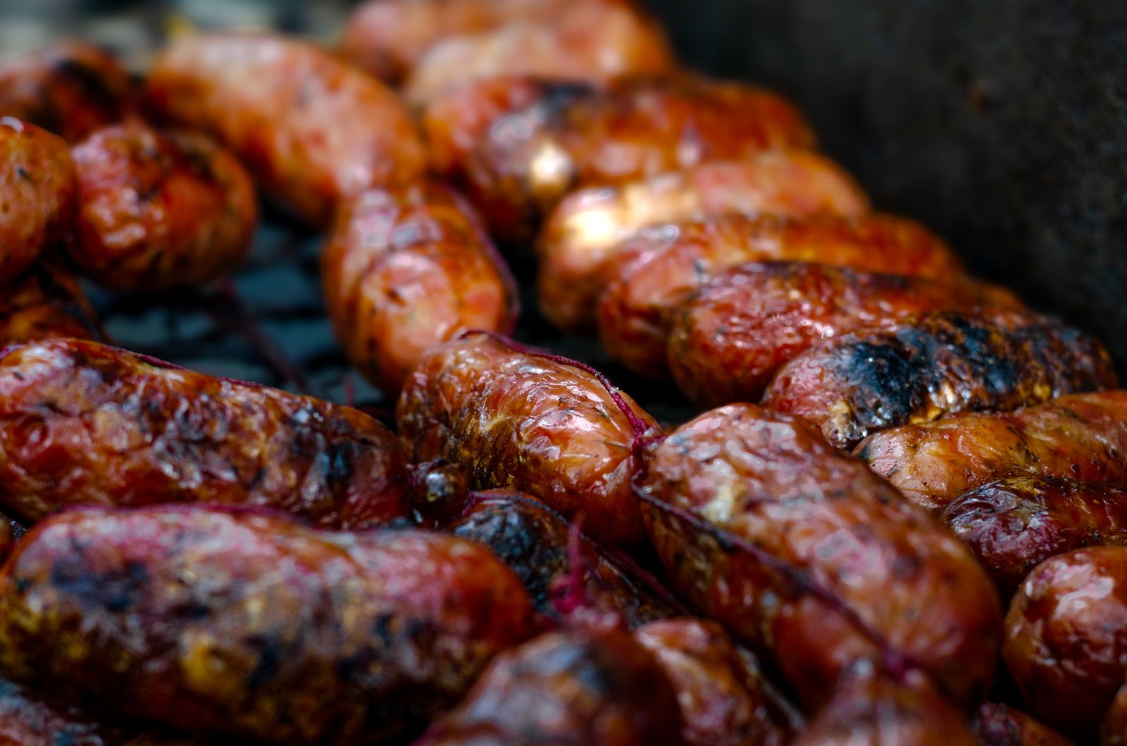 Chorizo sausages on a traditional Argentine grill
