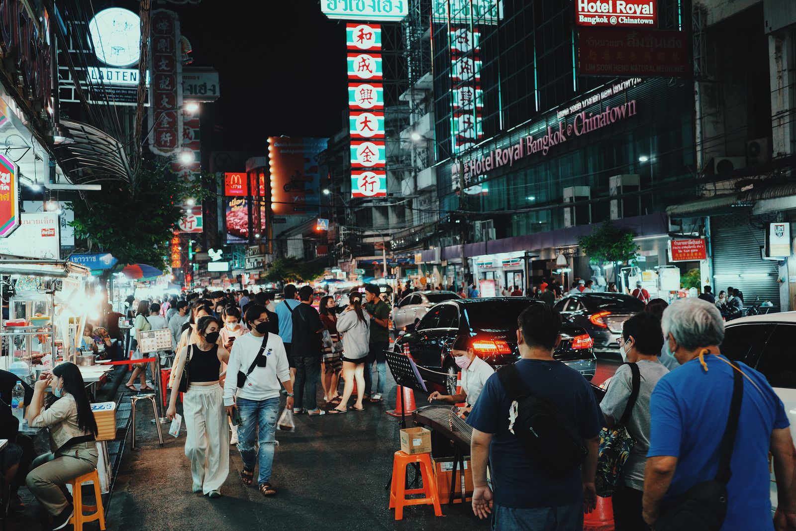 Street food and neon lights in Bangkok's Chinatown at night