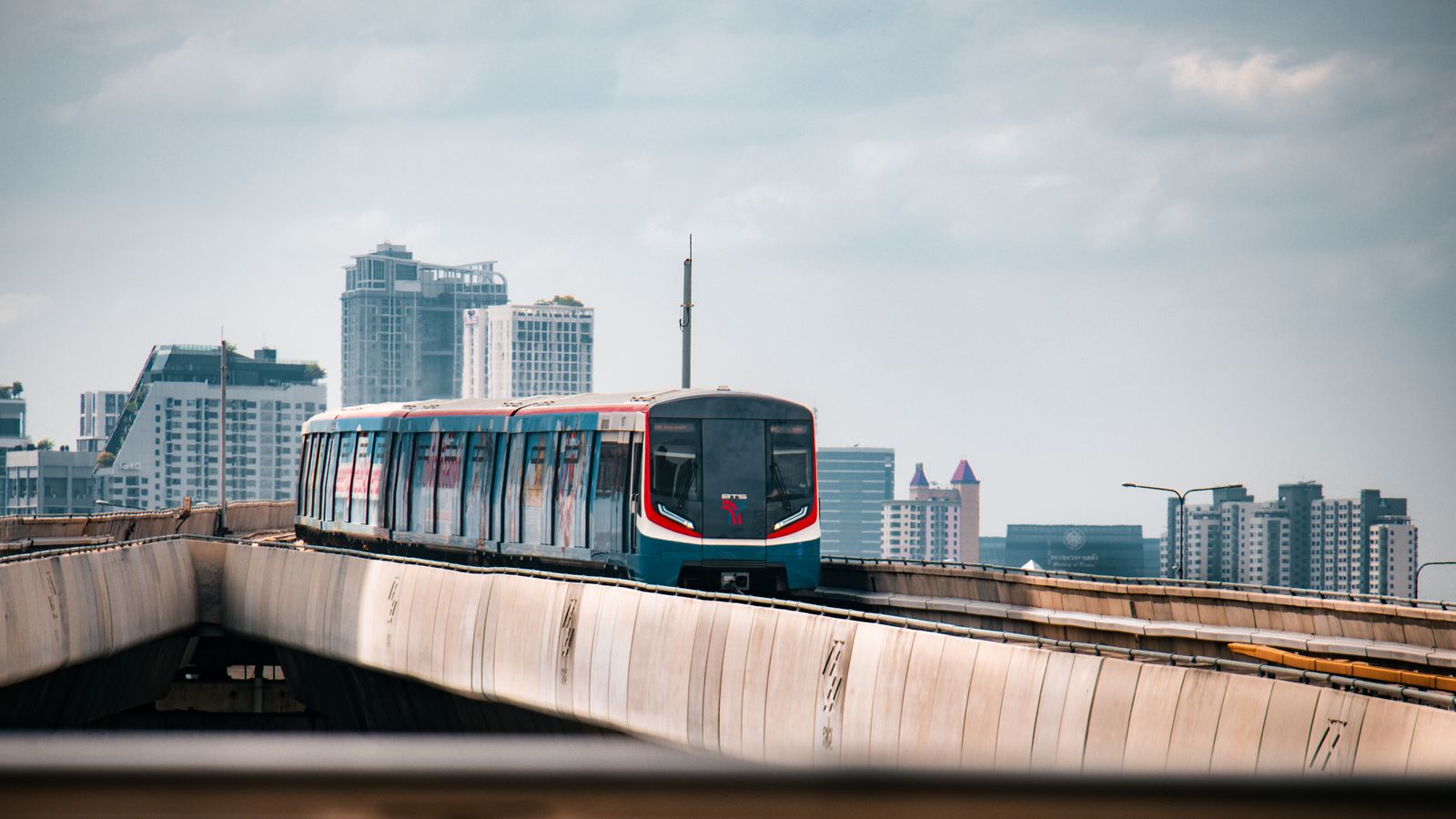 The BTS Skytrain crossing Bangkok with skyscrapers behind