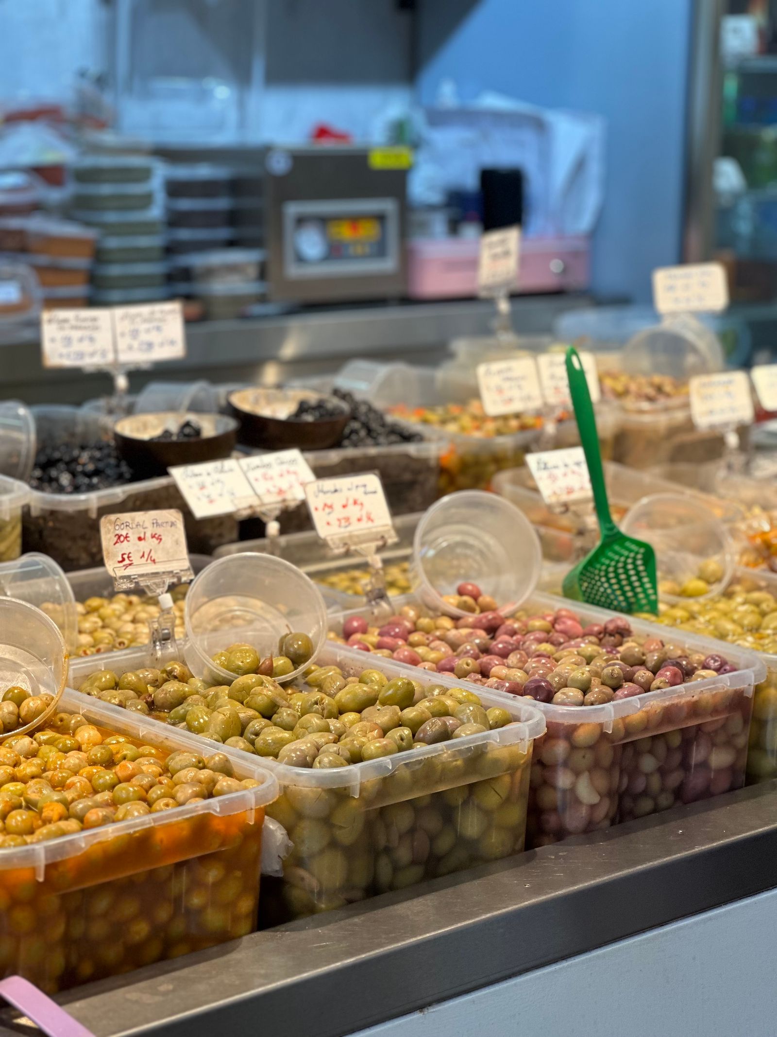Olives on display at a market stall in Malaga, Spain