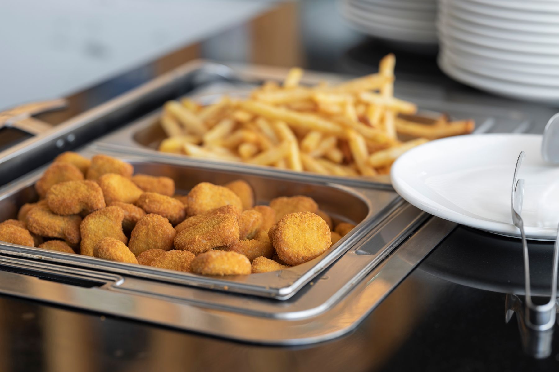 Golden fried tofu and fritters in a serving tray
