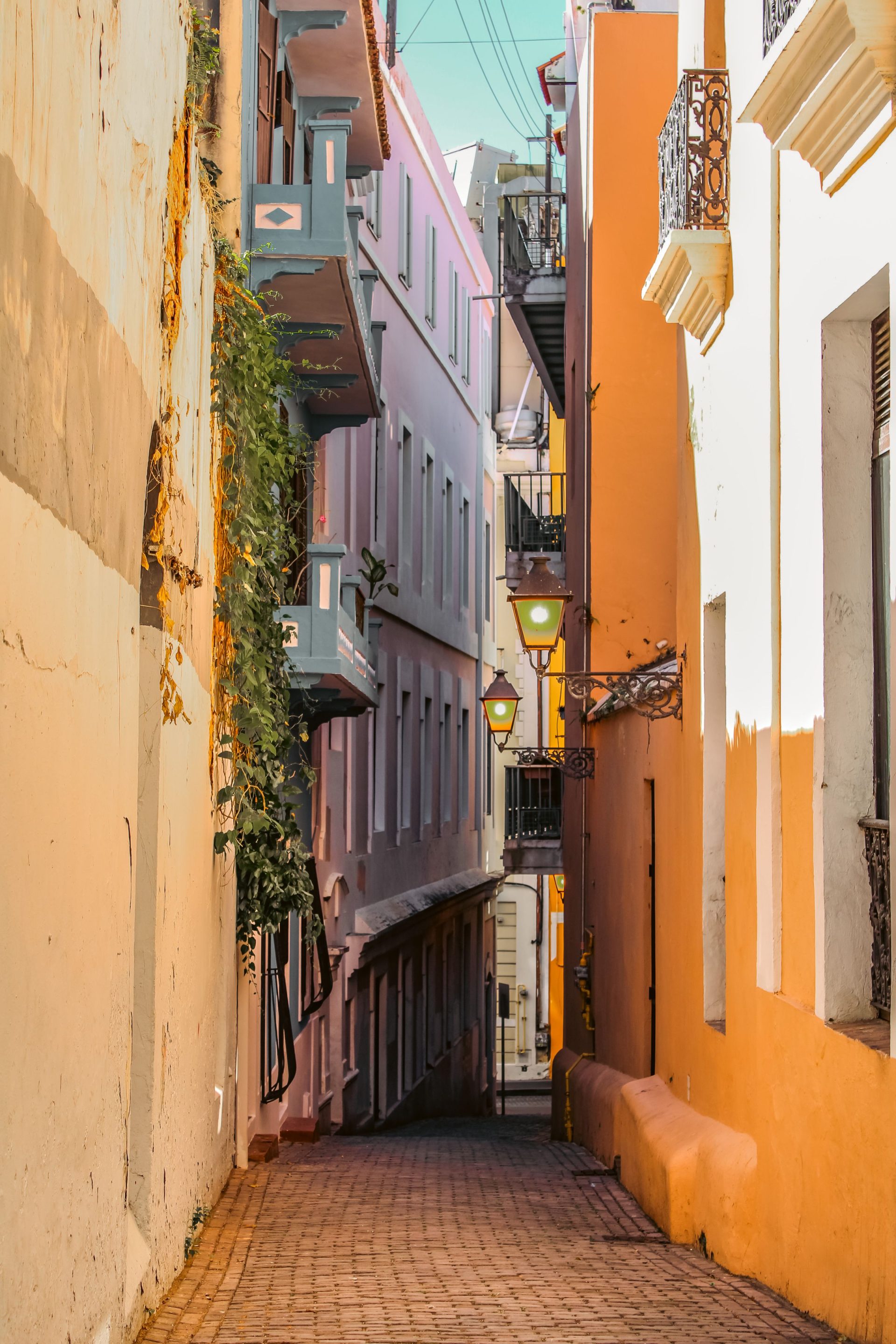 Narrow alley with a street lantern in the old town of San Juan, Puerto Rico