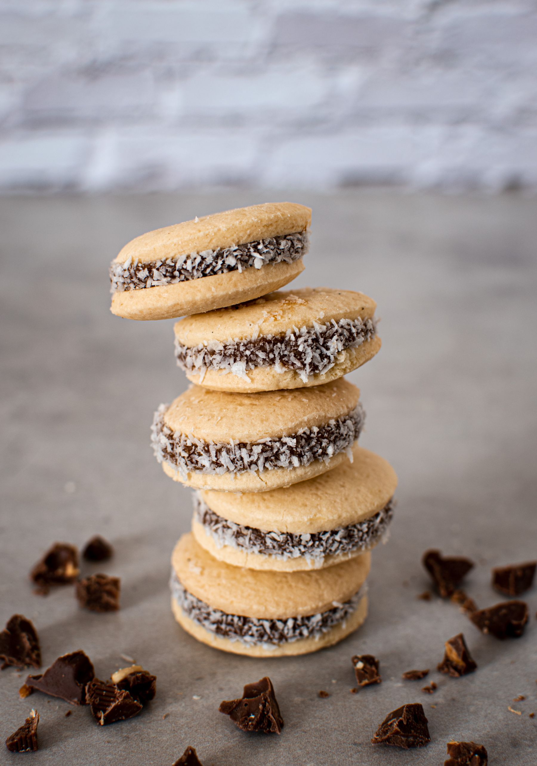 A stack of traditional Argentine alfajores filled with dulce de leche