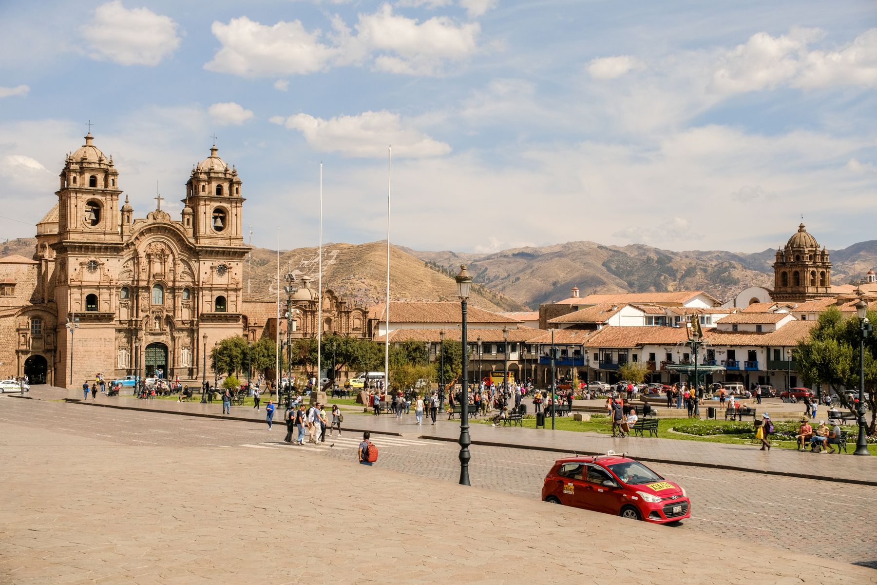 The historic Plaza de Armas in Cusco with the cathedral and people in the square