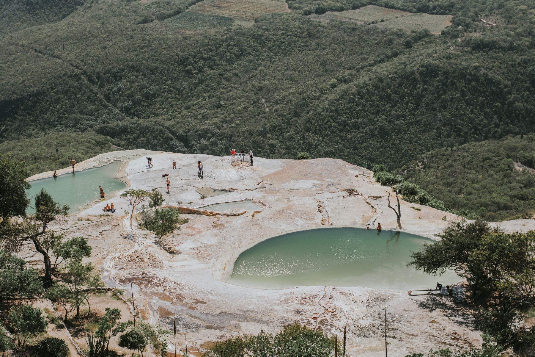 Visitors at the natural rock formations and mineral pools of Hierve el Agua in Oaxaca