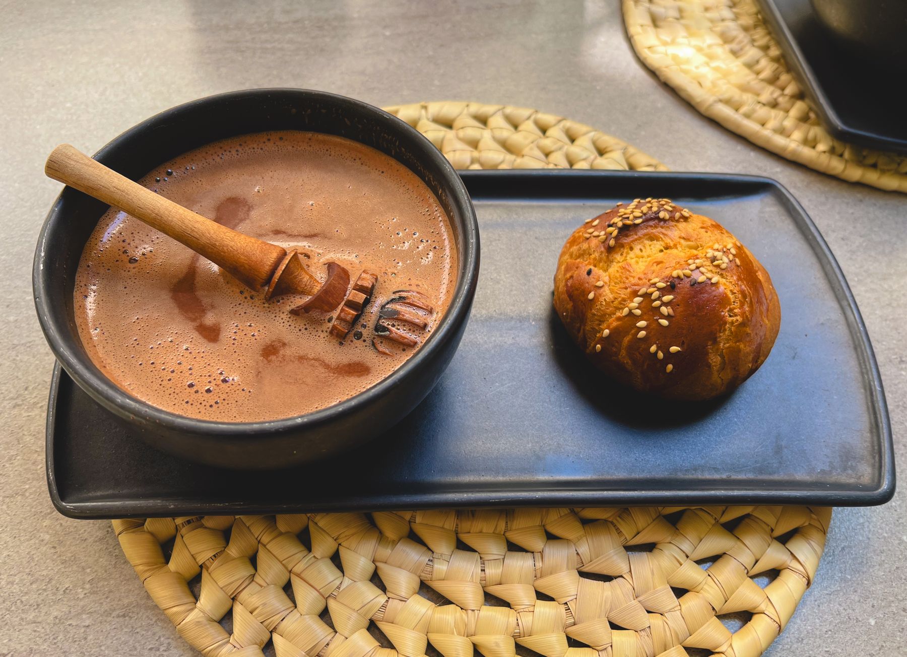 Mexican hot chocolate served with artisan pan de yema in Oaxaca de Juarez