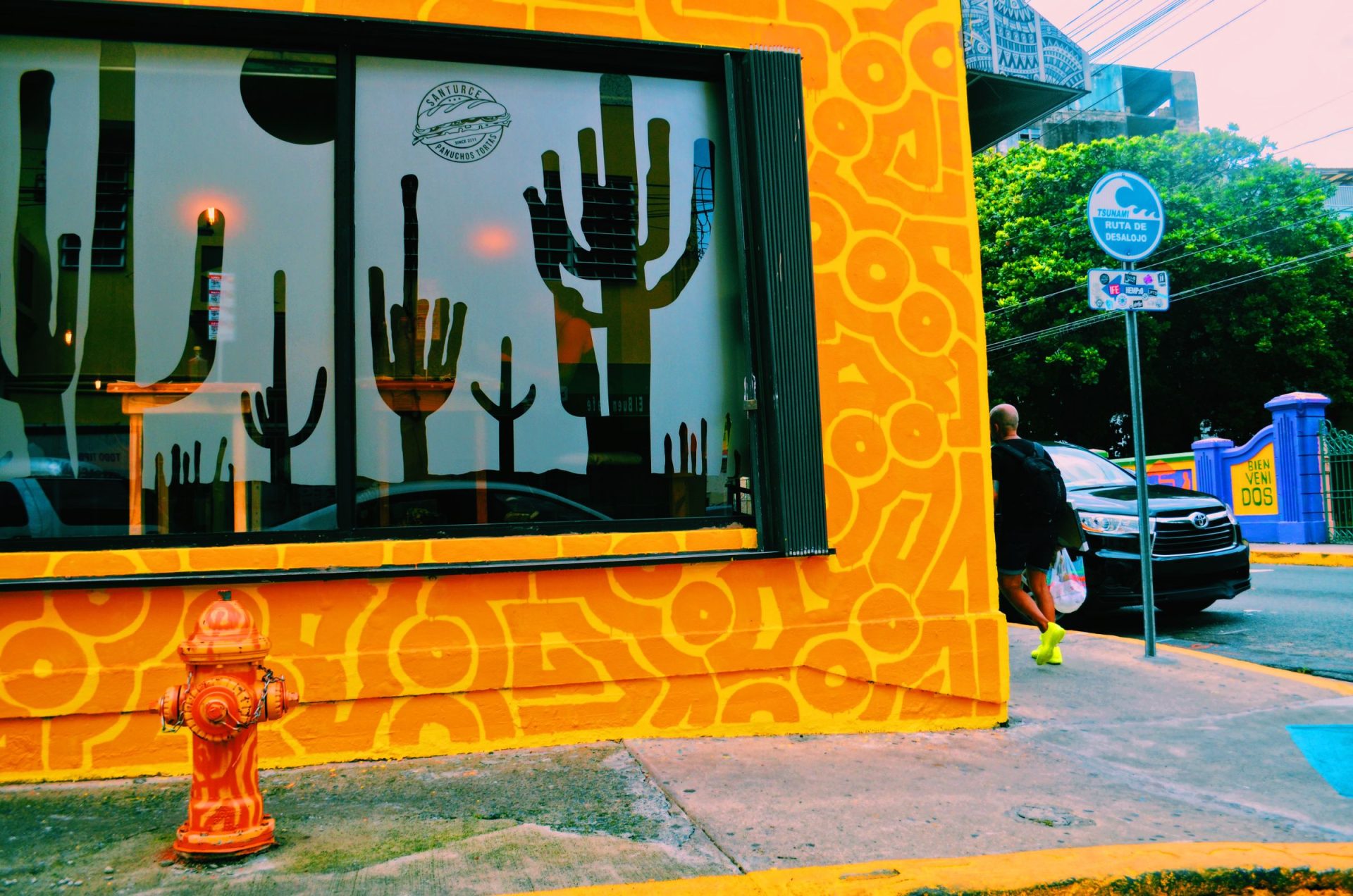Colorful painted storefront mural on a street in San Juan, Puerto Rico