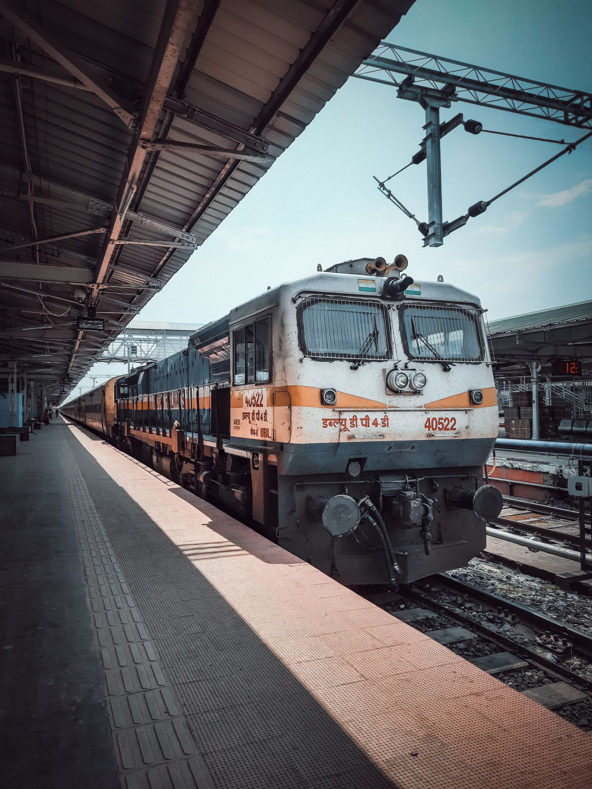 A train waiting at a station platform before an overnight departure