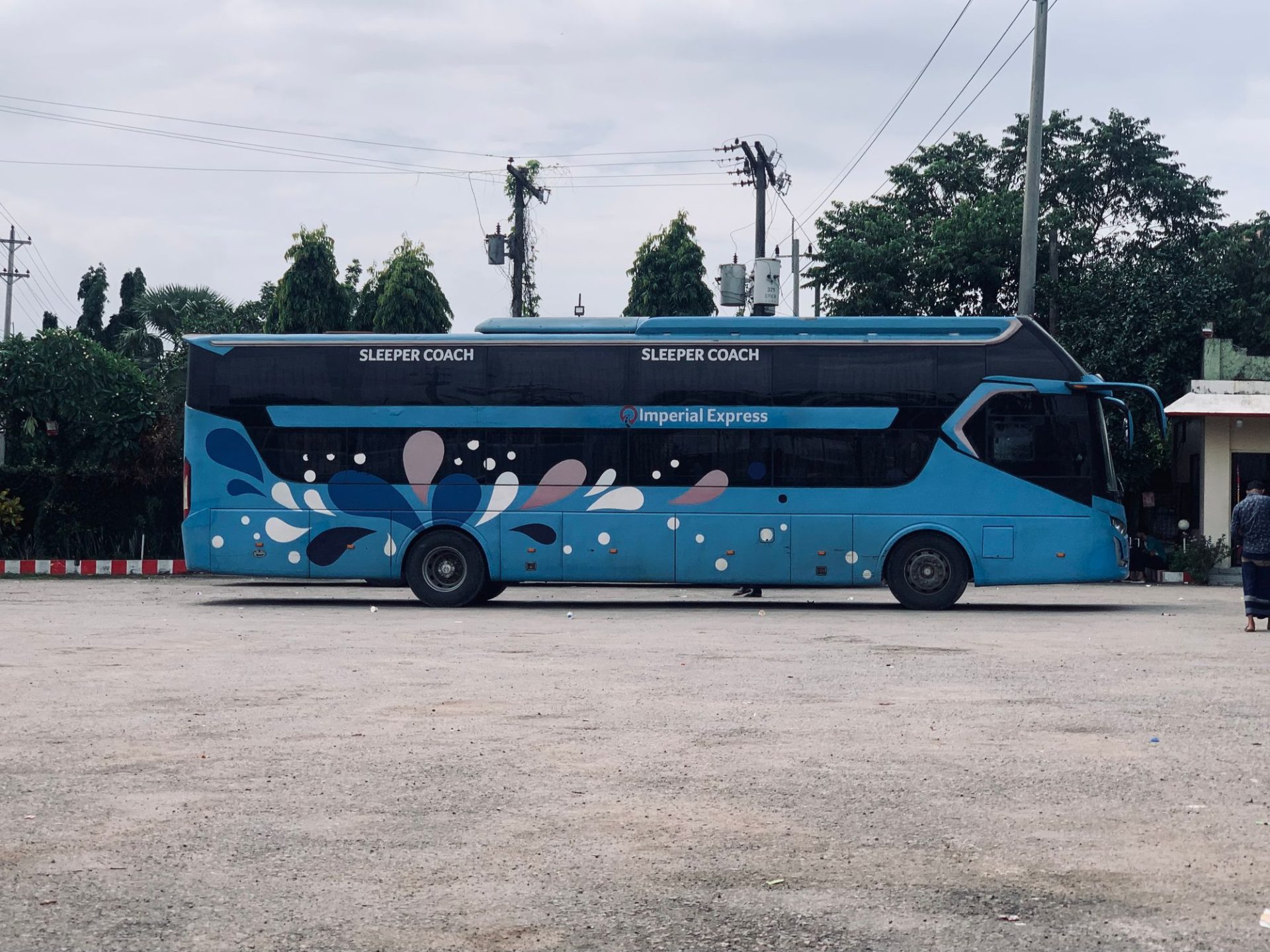 An intercity coach waiting at a bus terminal