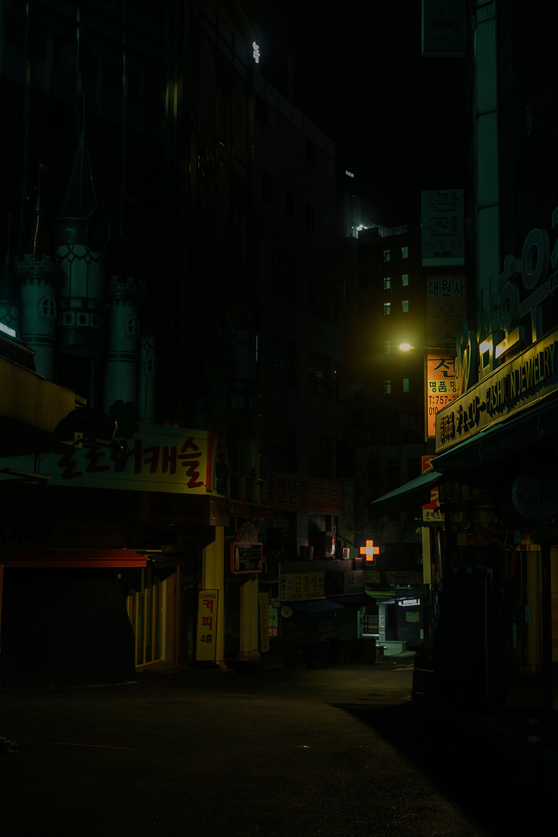 The dim interior of a late-night bar
