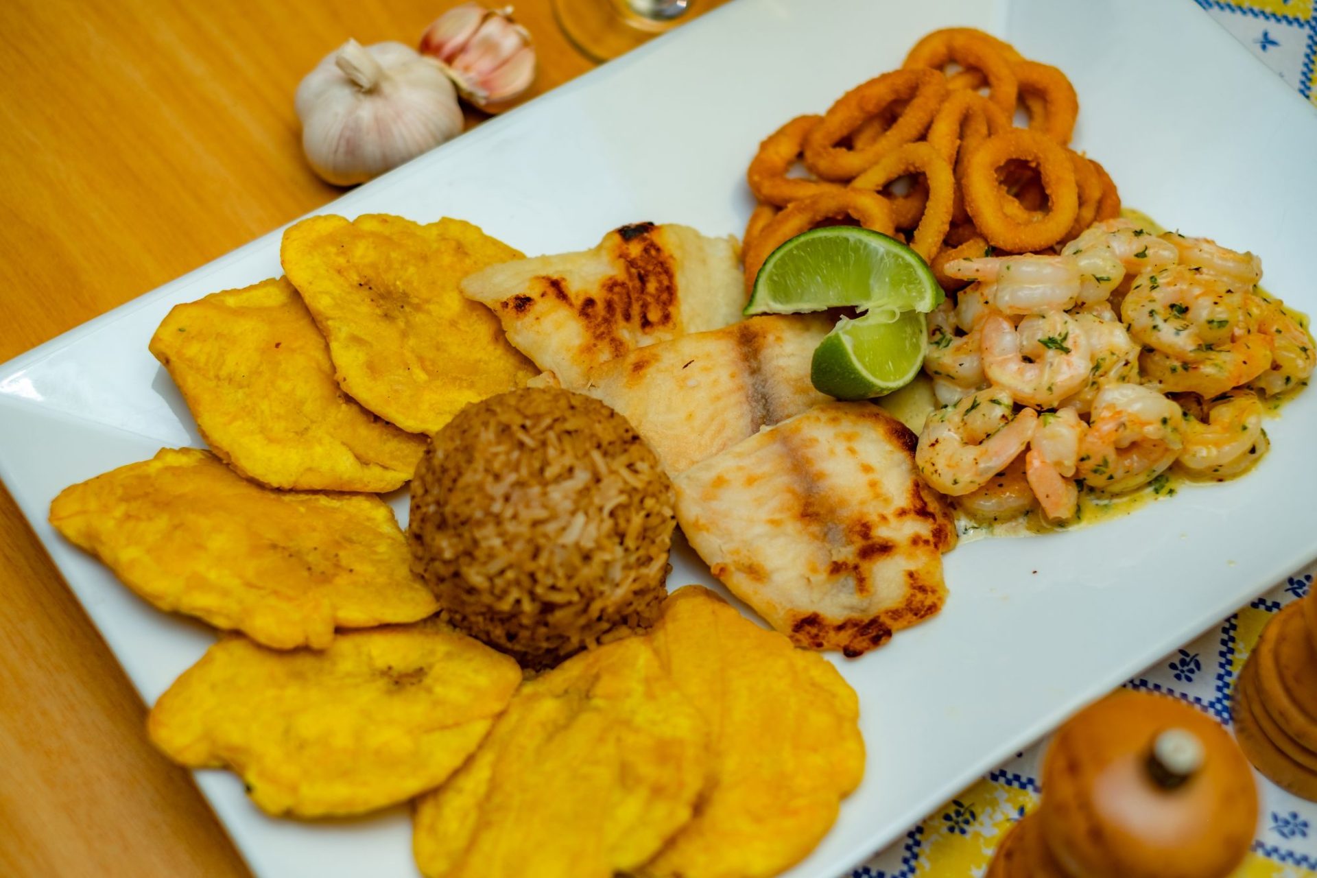 Seafood platter with prawns, fish and tostones