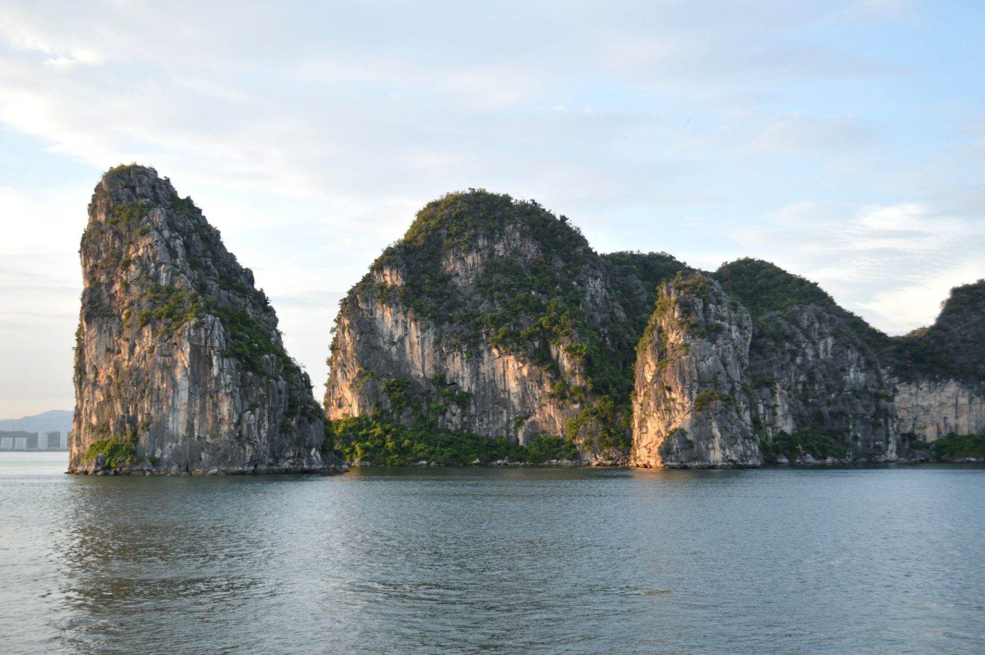 Fishing boats moored among limestone karst in a northern Vietnamese bay